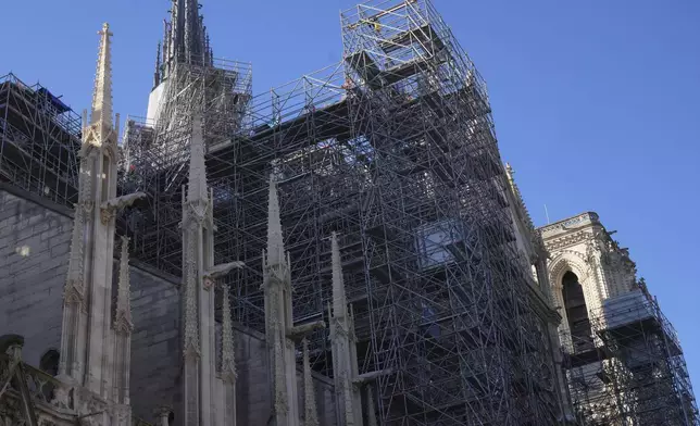 Scaffolding is still clinging to Notre-Dame cathedral, Thursday, Nov. 28, 2024 in Paris. (AP Photo/Michel Euler)