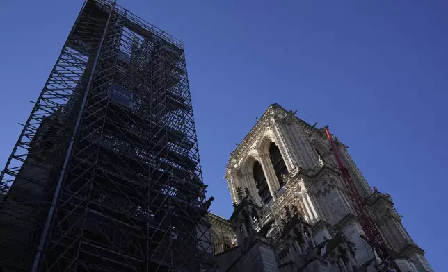 Scaffolding is still clinging to Notre-Dame cathedral, Thursday, Nov. 28, 2024 in Paris. (AP Photo/Michel Euler)