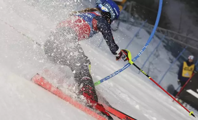 United States' Mikaela Shiffrin speeds down the course during an alpine ski, women's World Cup slalom, in Levi, Finland, Saturday, Nov. 16, 2024. (AP Photo/Marco Trovati)