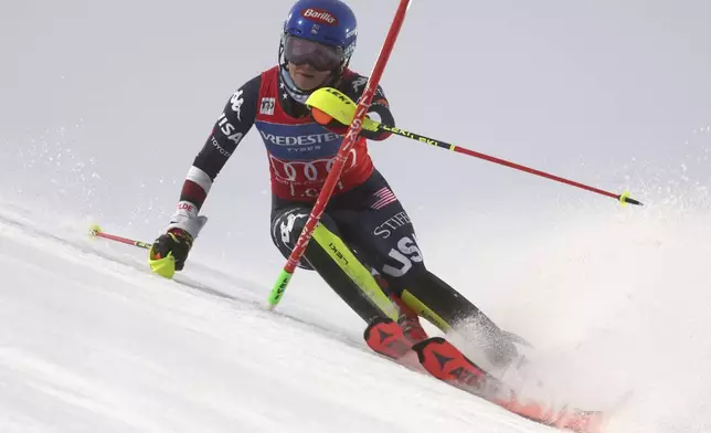 United States' Mikaela Shiffrin speeds down the course during an alpine ski, women's World Cup slalom, in Levi, Finland, Saturday, Nov. 16, 2024. (AP Photo/Marco Trovati)