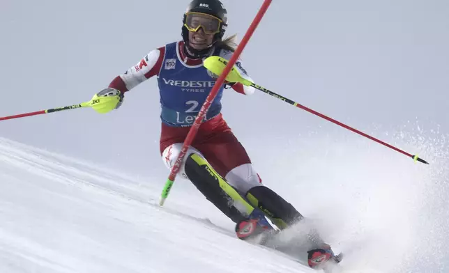 Austria's Katharina Liensberger speeds down the course during an alpine ski, women's World Cup slalom, in Levi, Finland, Saturday, Nov. 16, 2024. (AP Photo/Marco Trovati)