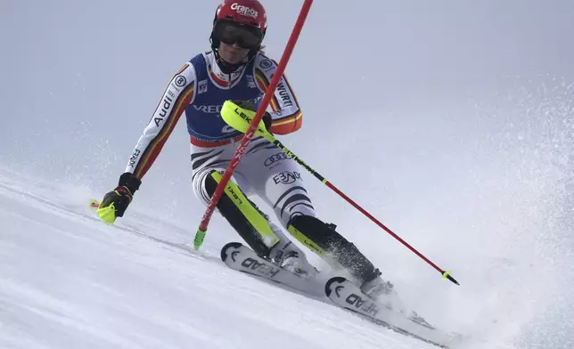 Germany's Lena Duerr speeds down the course during an alpine ski, women's World Cup slalom, in Levi, Finland, Saturday, Nov. 16, 2024. (AP Photo/Marco Trovati)