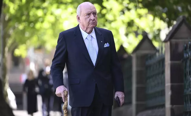 Retired Sydney broadcaster and former Australian national rugby coach Alan Jones arrives for the funeral service for Helena Carr at St Mary's Cathedral in Sydney, Australia, on Nov. 14, 2023. (Dean Lewins/AAP Image via AP)