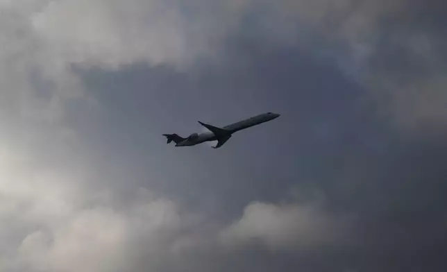 A Delta Airlines flight departs Hartsfield-Jackson International Airport, Tuesday, Nov. 26, 2024, in Atlanta. (AP Photo/Carolyn Kaster)