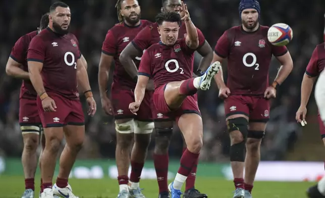 England's Marcus Smith kicks for touch during the Autumn Nations Series rugby union match between England and Japan at the Allianz Stadium Twickenham in London, Sunday, Nov. 24, 2024. (AP Photo/Alastair Grant)