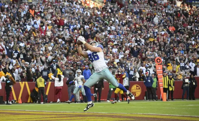 Dallas Cowboys tight end Luke Schoonmaker (86) catches a 22-yard touchdown pass during the second half of an NFL football game against the Washington Commanders, Sunday, Nov. 24, 2024, in Landover, Md. (AP Photo/Nick Wass)