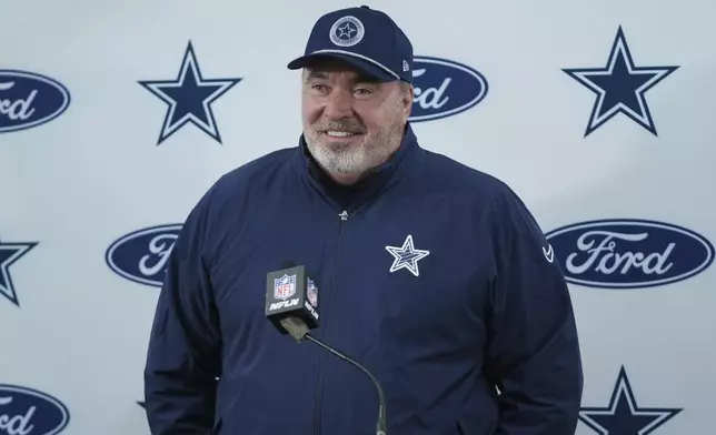 Dallas Cowboys head coach Mike McCarthy answers questions during a press conference after an NFL football game against the Washington Commanders, Sunday, Nov. 24, 2024, in Landover, Md. The Cowboys won 34-26. (AP Photo/Stephanie Scarbrough)