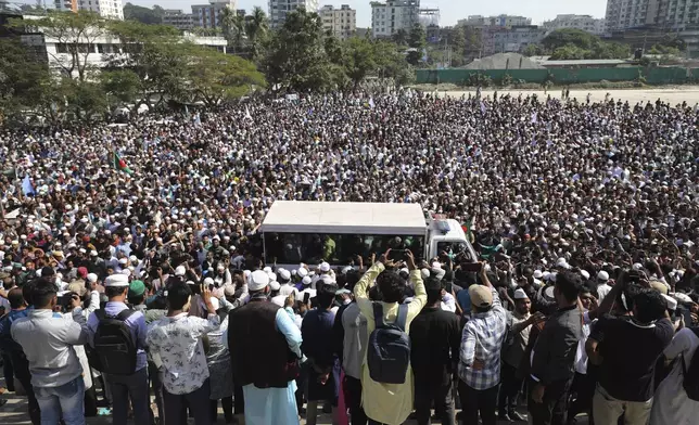 People participate in a funeral of a lawyer killed yesterday in a daylong violence over the arrest of a prominent minority Hindu leader at the court premises, in Chattogram in southeastern Bangladesh, Wednesday, Nov. 27, 2024. (AP Photo)