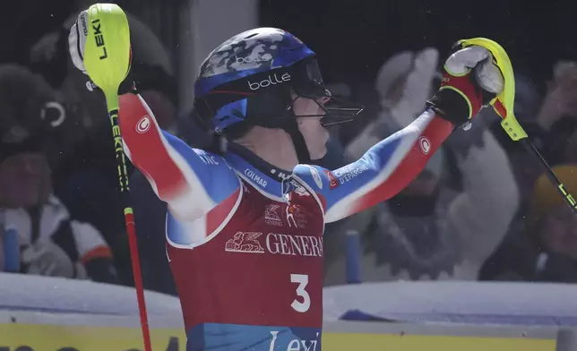 France's Clement Noel reacts after winning an alpine ski, men's World Cup slalom, in Levi, Finland, Sunday, Nov. 17, 2024. (AP Photo/Marco Trovati)