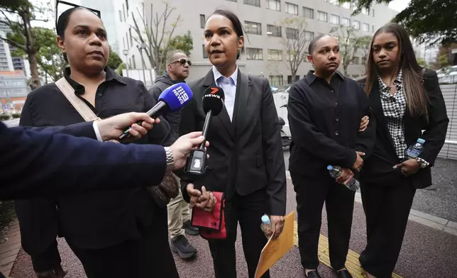 Family members of Australian citizen Donna Nelson speak to media before heading to the Chiba District Court on the opening day of the trial over Nelson for allegedly attempting to import drugs into Japan Monday, Nov. 18, 2024, in Chiba, east of Tokyo. (AP Photo/Eugene Hoshiko)