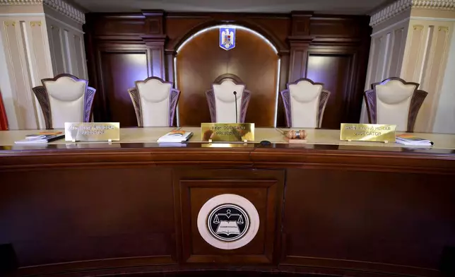 A gavel sits on the judges' table at the Constitutional Court in Bucharest, Romania, Thursday, Nov. 28, 2024. (AP Photo/Andreea Alexandru)