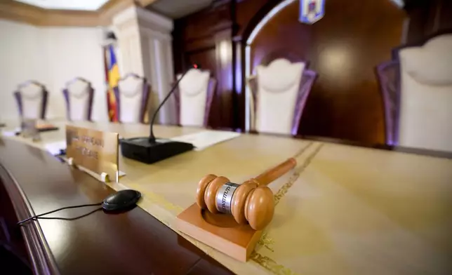 A gavel sits on the judges' table at the Constitutional Court in Bucharest, Romania, Thursday, Nov. 28, 2024. (AP Photo/Andreea Alexandru)