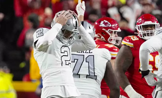 Las Vegas Raiders place kicker Daniel Carlson (2) reacts after missing a field goal late in the fourth quarter against the Kansas City Chiefs in an NFL football game in Kansas City, Mo., Friday, Nov. 29, 2024. (AP Photo/Ed Zurga)