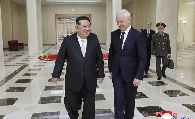 In this photo provided by the North Korean government, North Korean leader Kim Jong Un, left, meets Russian Defense Minister Andrei Belousov in Pyongyang, North Korea Friday, Nov. 29, 2024. Independent journalists were not given access to cover the event depicted in this image distributed by the North Korean government. The content of this image is as provided and cannot be independently verified. Korean language watermark on image as provided by source reads: "KCNA" which is the abbreviation for Korean Central News Agency. (Korean Central News Agency/Korea News Service via AP)