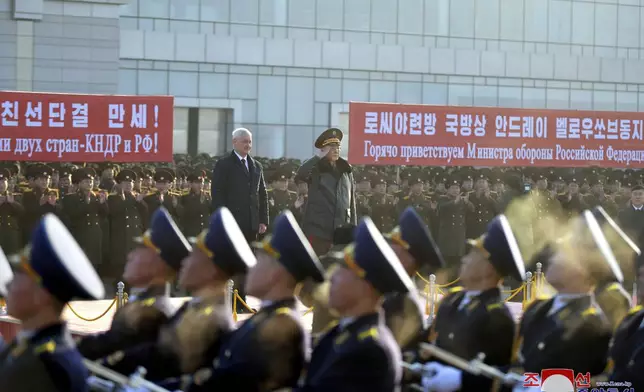 In this photo provided by the North Korean government, Russian Defense Minister Andrei Belousov, center left, with North Korean Defense Minister No Kwang Chol, center right, attends a welcome ceremony on his arrival at a Pyongyang airport, North Korea Friday, Nov. 29, 2024. Independent journalists were not given access to cover the event depicted in this image distributed by the North Korean government. The content of this image is as provided and cannot be independently verified. Korean language watermark on image as provided by source reads: "KCNA" which is the abbreviation for Korean Central News Agency. (Korean Central News Agency/Korea News Service via AP)