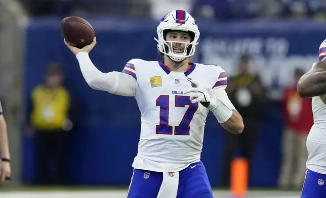 Buffalo Bills quarterback Josh Allen (17) tlooks to throw a pass during the second half of an NFL football game against the Indianapolis Colts, Sunday, Nov. 10, 2024, in Indianapolis. (AP Photo/Darron Cummings)