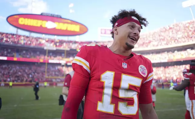 Kansas City Chiefs quarterback Patrick Mahomes smiles following an NFL football game against the Denver Broncos Sunday, Nov. 10, 2024, in Kansas City, Mo. The Chiefs won 16-14. (AP Photo/Charlie Riedel)