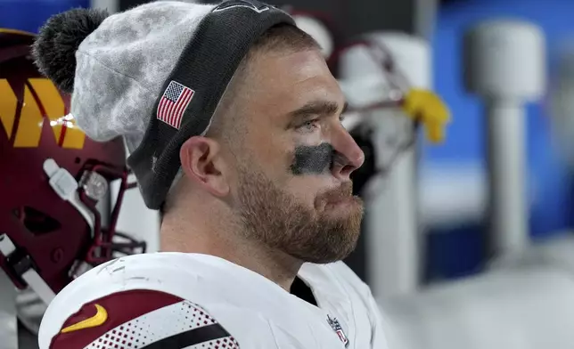 Washington Commanders tight end Zach Ertz sits on the bench during the second half of an NFL football game against the Philadelphia Eagles Thursday, Nov. 14, 2024, in Philadelphia. (AP Photo/Chris Szagola)