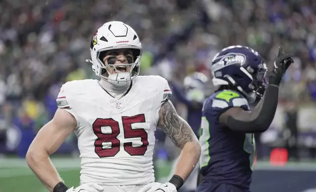 Arizona Cardinals tight end Trey McBride (85) reacts after an incomplete pass on the third down in the end zone during the second half of an NFL football game against the Seattle Seahawks, Sunday, Nov. 24, 2024, in Seattle. (AP Photo/Stephen Brashear)