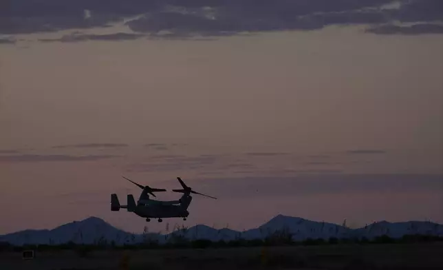 FILE - Marine Two, an Osprey tilt-rotor aircraft, with Democratic presidential nominee Vice President Kamala Harris aboard, departs after she visited the border and spoke in Douglas, Ariz., Sept. 27, 2024. (AP Photo/Carolyn Kaster, File)