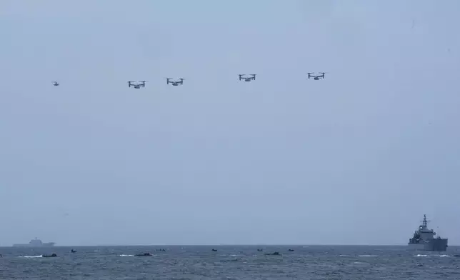 FILE - U.S. Osprey transport aircraft participate in the combined military amphibious landing exercise between South Korea and the U.S., called Ssangyong exercise, in Pohang, South Korea, Sept. 2, 2024. (AP Photo/Ahn Young-joon)