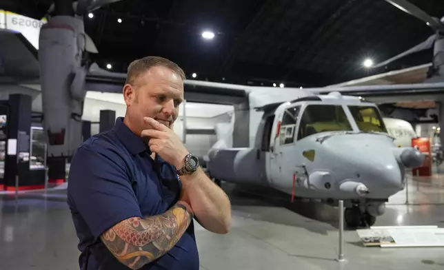 Former Air Force Osprey pilot Brian Luce poses for a portrait inside of the Wright Patterson AFB Air Force Museum, Aug. 9, 2024, in Dayton, Ohio. (AP Photo/Jeff Dean)