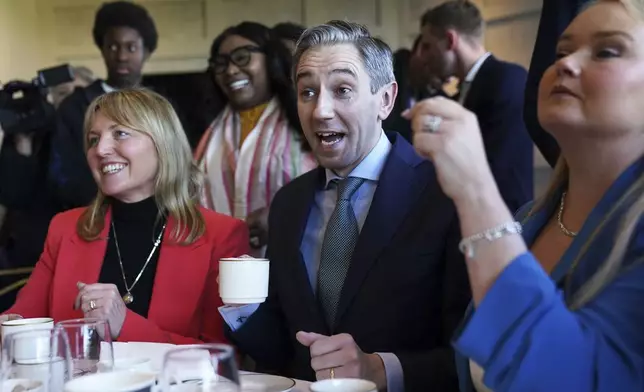 Taoiseach and Fine Gael leader Simon Harris center, during a rally at Trim Castle Hotel in Trim, Co Meath, Ireland, Wednesday, Nov. 27, 2024. (Brian Lawless/PA via AP)