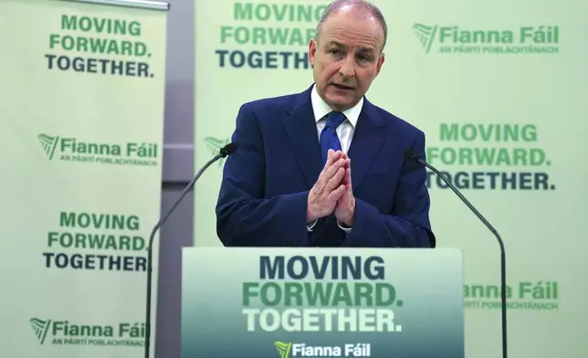 Tanaiste and Fianna Fail Leader Micheal Martin speaks to the media during a press event at the Radisson Blu Royal Hotel, on Golden Lane, Dublin, Wednesday Nov. 27, 2024, ahead of the General Election on November 29. (Brian Lawless/PA via AP)