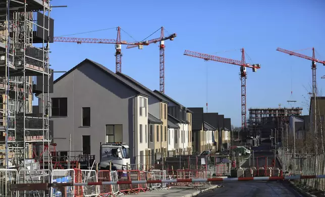 Construction work on building new houses in Clonburris, South Dublin, Ireland, Tuesday, Nov. 26, 2024, ahead of Ireland's election on Friday. (AP Photo/Peter Morrison)