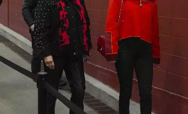 Singer Taylor Swift, right, and Donna Kelce arrive before the start of an NFL football game between the Las Vegas Raiders and the Kansas City Chiefs in Kansas City, Mo., Friday, Nov. 29, 2024. (AP Photo/Charlie Riedel)