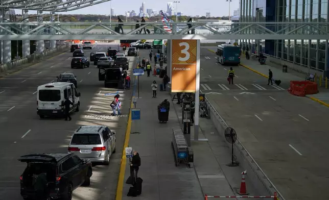 FILE - A view of Charlotte Douglas International Airport, Friday, Nov. 22, 2024, in Charlotte, N.C. (AP Photo/Erik Verduzco, File)