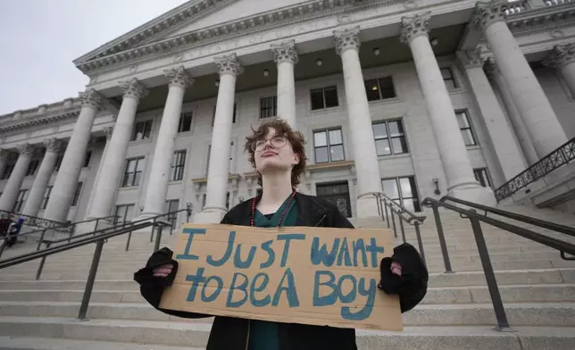 FILE - Tree Crane, 17, stands for a portrait following a rally where hundreds gathered in support of transgender youth at the Utah State Capitol Tuesday, Jan. 24, 2023, in Salt Lake City. (AP Photo/Rick Bowmer, File)