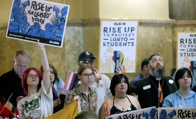 FILE - Kansas high school students, family members and advocates rally for transgender rights at the Statehouse in Topeka, Kan., on Jan. 31, 2024. (AP Photo/John Hanna, File)