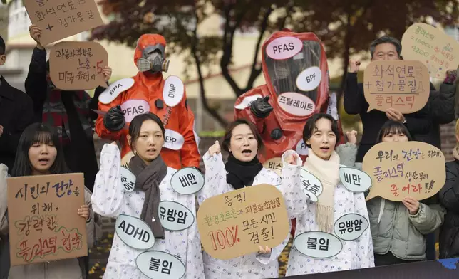 Environment activists shout slogans during a rally calling for a strong global plastics treaty ahead of the fifth session of the Intergovernmental Negotiating Committee on Plastic Pollution which sets to be held in Busan from Nov. 25 to Dec. 1, in Seoul, South Korea, Wednesday, Nov. 20, 2024. (AP Photo/Lee Jin-man)