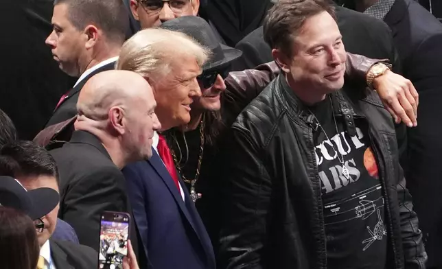 President-elect Donald Trump poses for a photo with Dana White, Kid Rock and Elon Musk at UFC 309 at Madison Square Garden, Saturday, Nov. 16, 2024, in New York. (AP Photo/Evan Vucci)