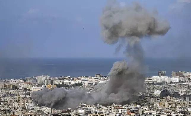 Smoke rises after an Israeli airstrike on Dahiyeh, in the southern suburb of Beirut, Lebanon, Saturday, Nov. 16, 2024. (AP Photo/Bilal Hussein)