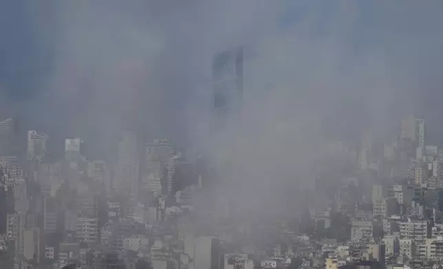 Smoke rises after an Israeli airstrike on Dahiyeh, in the southern suburb of Beirut, Lebanon, Saturday, Nov. 16, 2024. (AP Photo/Bilal Hussein)