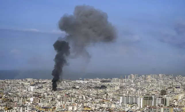 Smoke rises after an Israeli airstrike on Dahiyeh, in the southern suburb of Beirut, Lebanon, Saturday, Nov. 16, 2024. (AP Photo/Bilal Hussein)