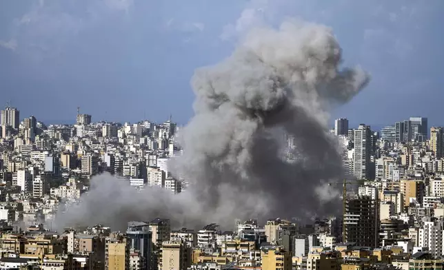 Smoke rises after an Israeli airstrike on Dahiyeh, in the southern suburb of Beirut, Lebanon, Saturday, Nov. 16, 2024. (AP Photo/Bilal Hussein)