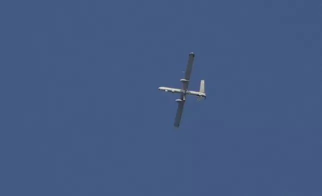 An Israeli drone flies over Dahiyeh, in the southern suburb of Beirut, Lebanon, Saturday, Nov. 16, 2024. (AP Photo/Bilal Hussein)