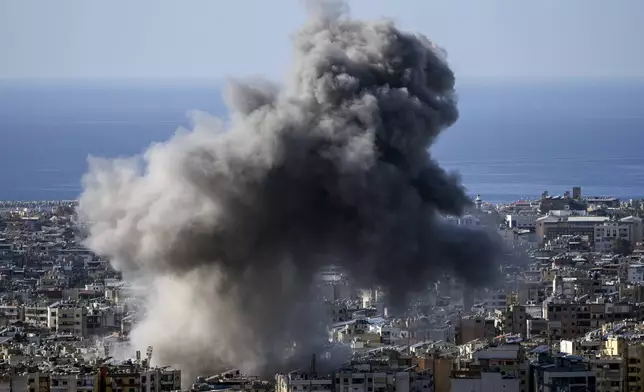 Smoke rises after an Israeli airstrike on Dahiyeh, in the southern suburb of Beirut, Lebanon, Saturday, Nov. 16, 2024. (AP Photo/Bilal Hussein)