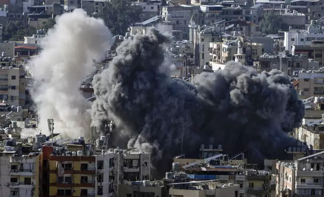 Smoke rises after an Israeli airstrike on Dahiyeh, in the southern suburb of Beirut, Lebanon, Saturday, Nov. 16, 2024. (AP Photo/Bilal Hussein)