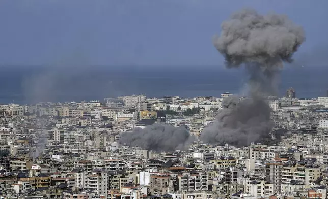 Smoke rises after an Israeli airstrike on Dahiyeh, in the southern suburb of Beirut, Lebanon, Saturday, Nov. 16, 2024. (AP Photo/Bilal Hussein)