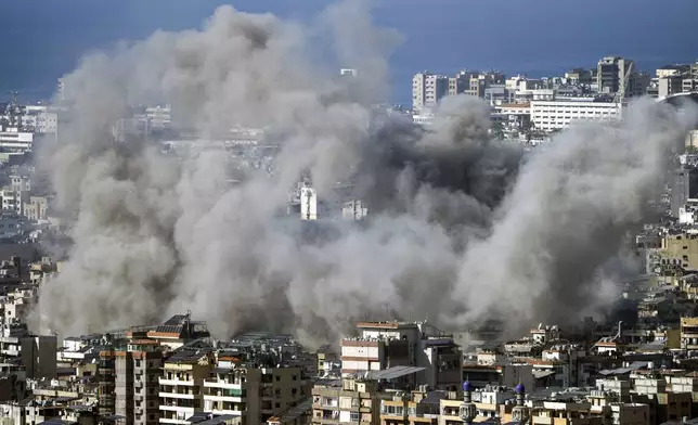 Smoke rises after an Israeli airstrike on Dahiyeh, in the southern suburb of Beirut, Lebanon, Saturday, Nov. 16, 2024. (AP Photo/Bilal Hussein)