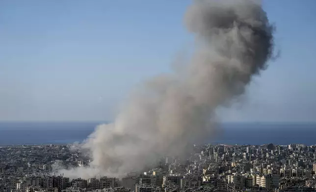 Smoke rises after an Israeli airstrike on Dahiyeh, in the southern suburb of Beirut, Lebanon, Saturday, Nov. 16, 2024. (AP Photo/Bilal Hussein)