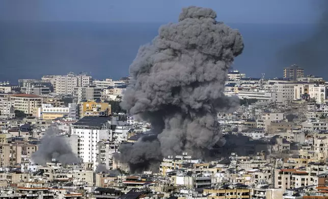 Smoke rises after an Israeli airstrike on Dahiyeh, in the southern suburb of Beirut, Lebanon, Saturday, Nov. 16, 2024. (AP Photo/Bilal Hussein)