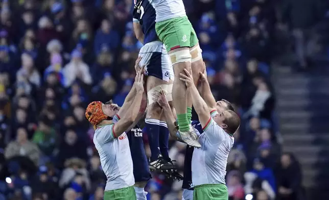 Portugal's Antonio Rebelo de Andrade wins the ball in a lineout during the Autumn Nations series rugby union match between Scotland and Portugal at the Scottish Gas Murrayfield Stadium, in Edinburgh, Scotland, Saturday Nov. 16, 2024. (Jane Barlow/PA via AP)