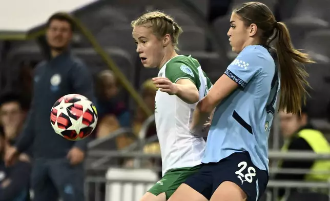 Hammarby's Julie Blakstad and Manchester City's Gracie Prior in action during the women's Champions League soccer match between Hammarby IF and Manchester City at Tele2 Arena, Stockholm, Sweden, Thursday Nov. 21, 2024. (Claudio Bresciani/TT via AP)