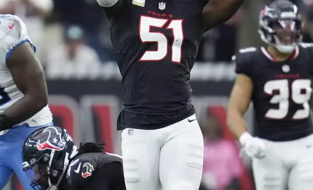 Houston Texans defensive end Will Anderson Jr. (51) celebrates a sack during the first half of an NFL football game against the Tennessee Titans, Sunday, Nov. 24, 2024, in Houston. (AP Photo/Ashley Landis)