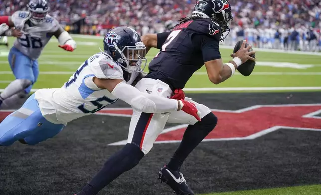 Tennessee Titans linebacker Harold Landry III (58) sacks Houston Texans quarterback C.J. Stroud (7) in the end zone for a safety during the second half an NFL football game Sunday, Nov. 24, 2024, in Houston. (AP Photo/Eric Christian Smith)